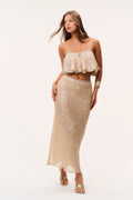 Shimmering sand-toned sequin maxi skirt with fitted silhouette