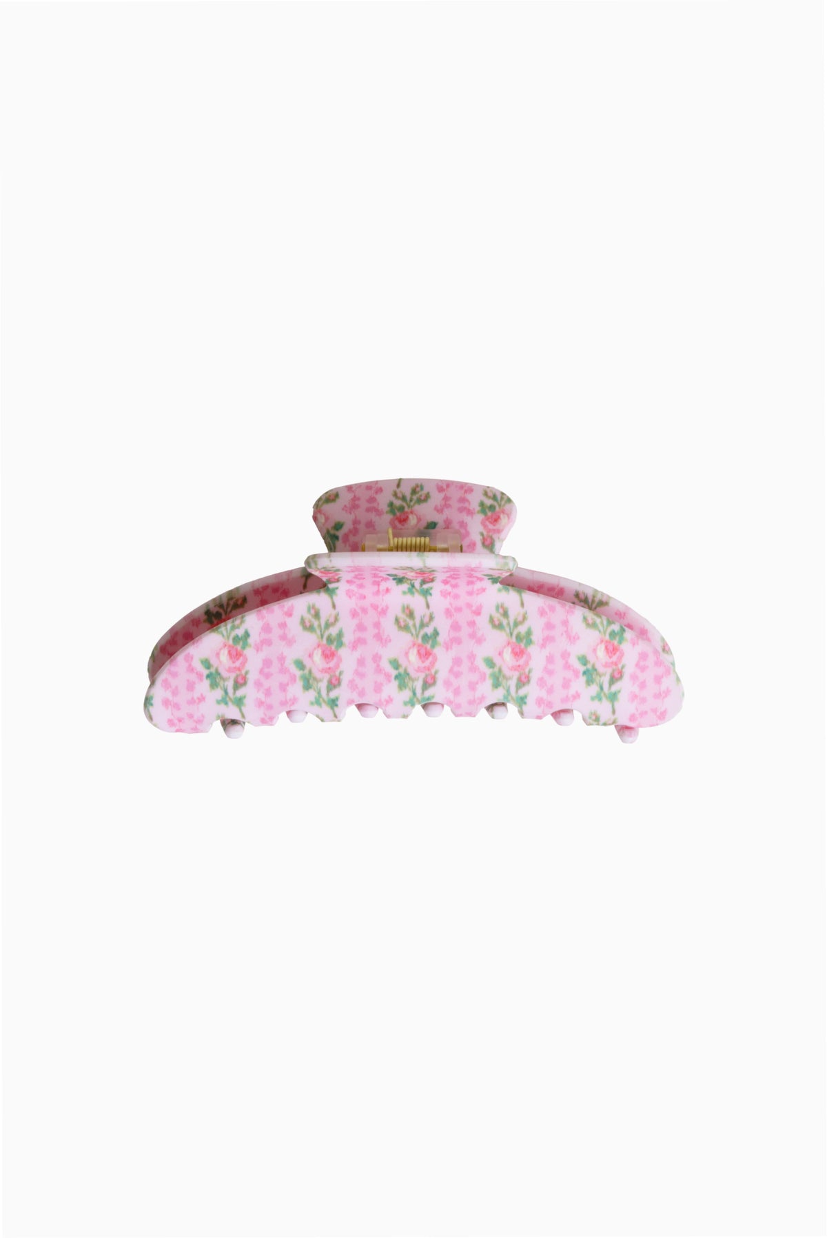 Large pink floral claw clip with ruffled edges and wide grip
