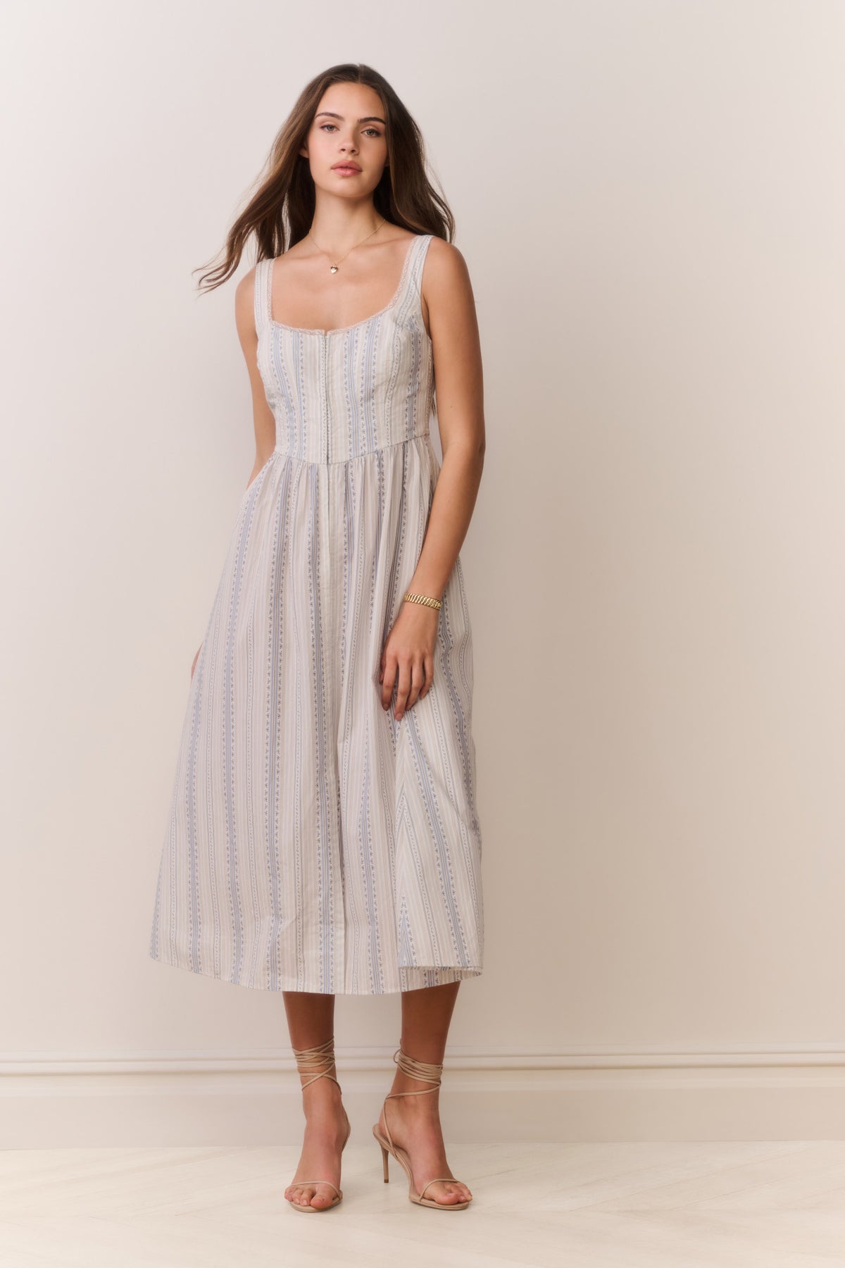 Light blue pinstripe cotton midi dress with square neckline and sleeveless bustier fit