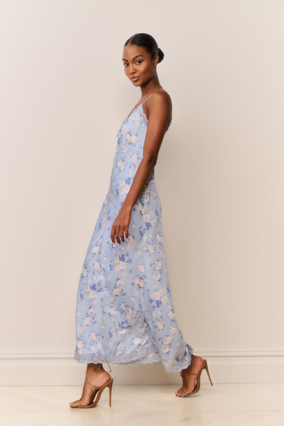 Blue floral maxi slip dress with lace-trim V-neck and spaghetti straps, side view