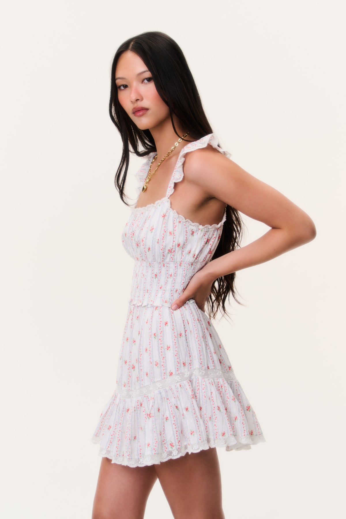 Backless-style cherry mini dress with ruffled shoulder straps and tiered skirt