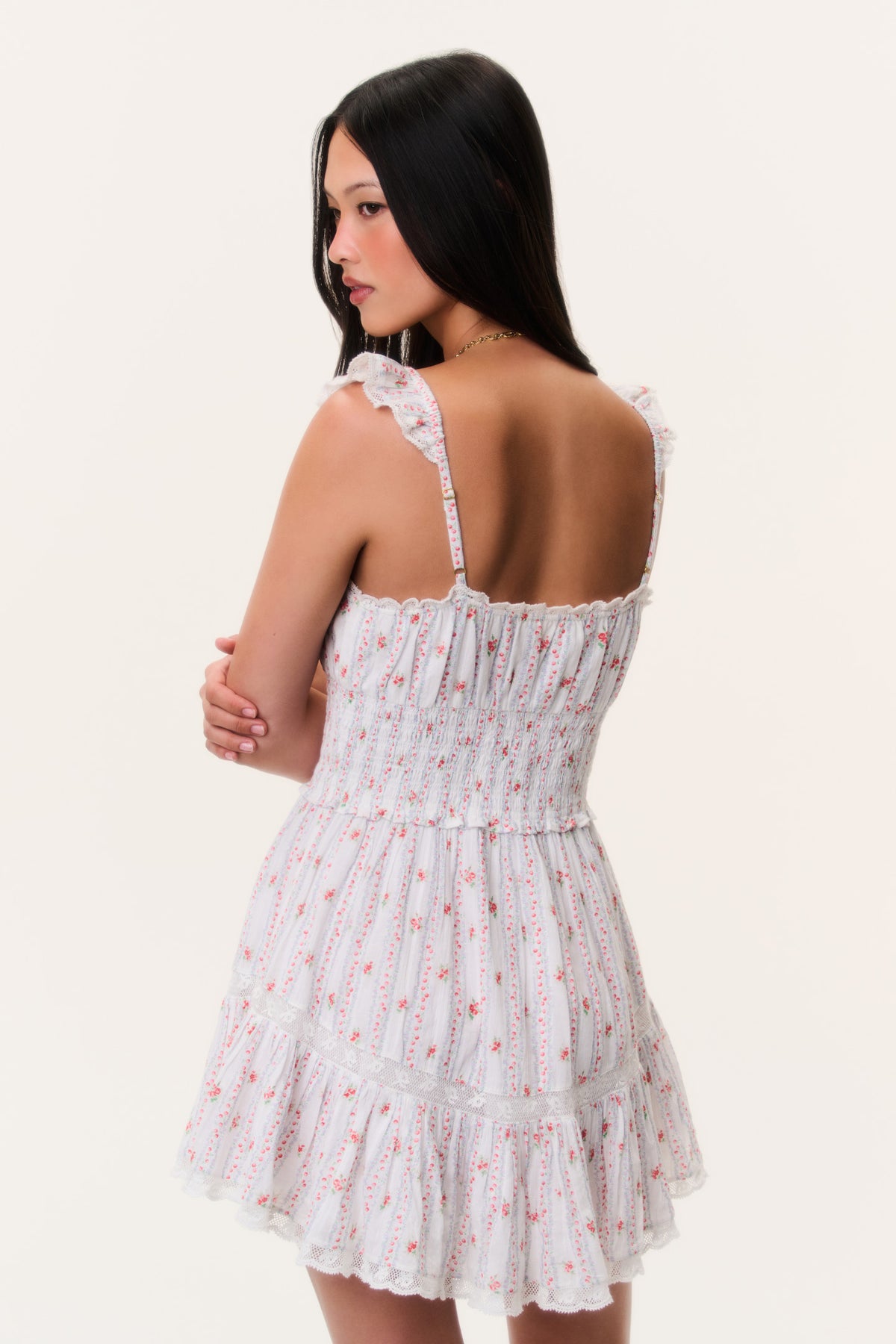 Cherry stripe mini dress, back view with open back and tiered ruffle hem