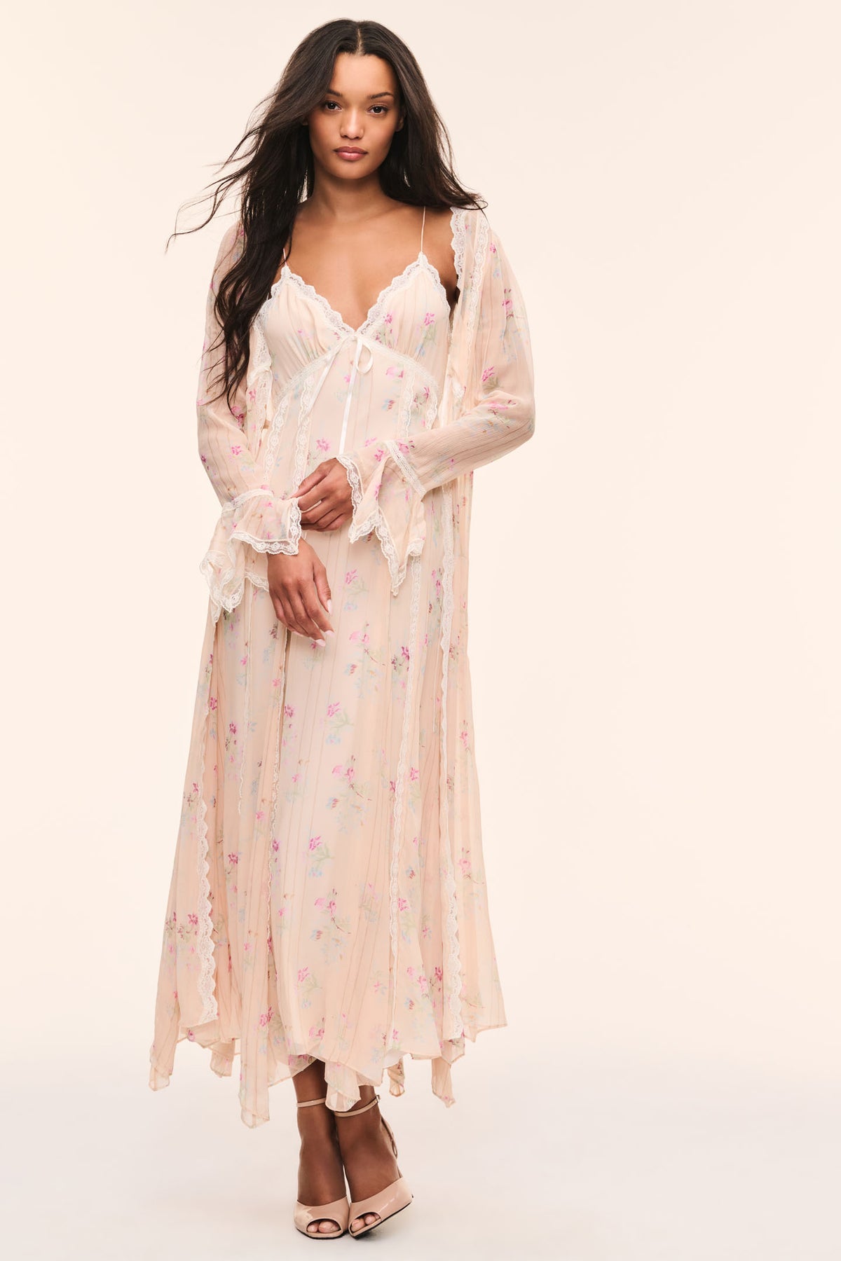 Sheer floral silk duster with lace-trim V neckline and long ruffled sleeves