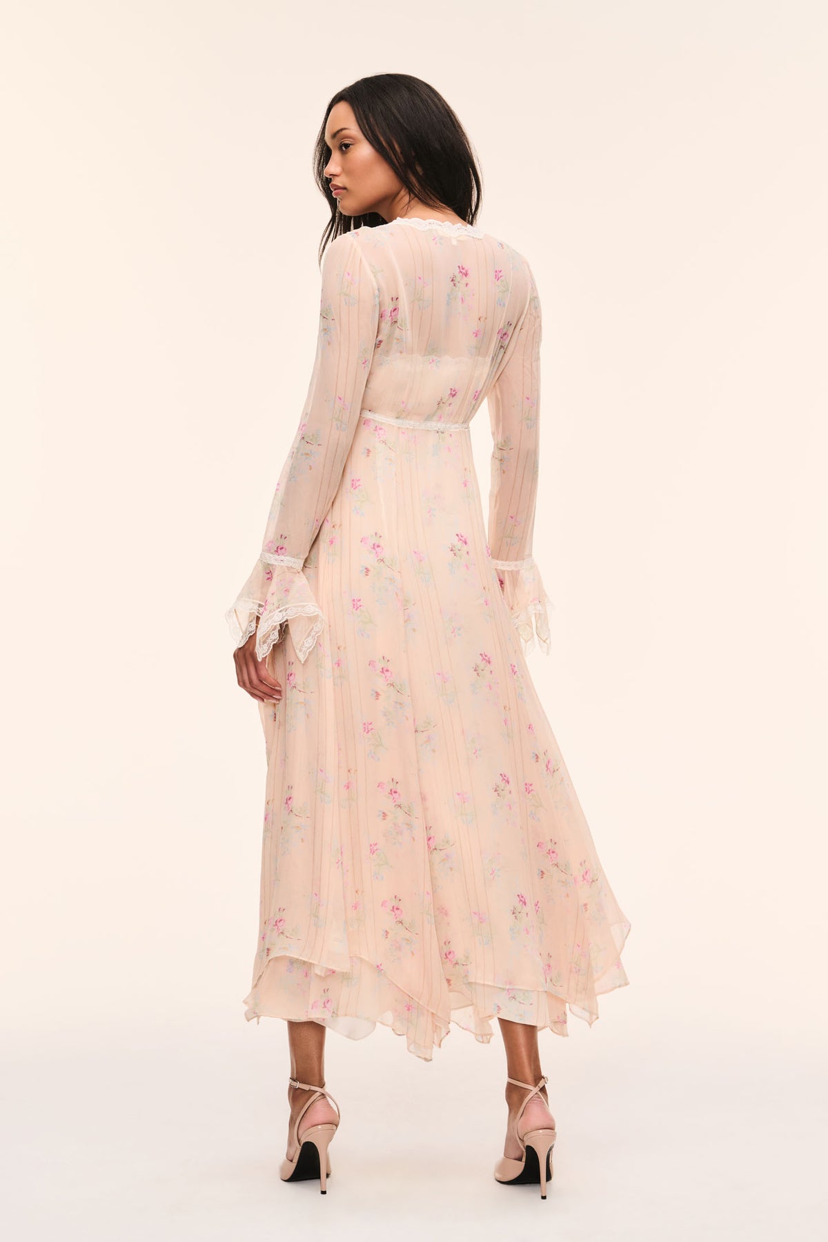 Sheer floral silk duster from back with lace-trim edges and tiered hem