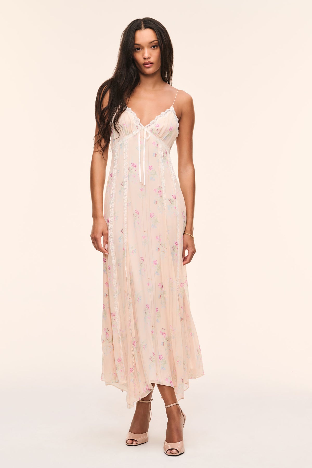 Cream silk slip dress with spaghetti straps, lace trim V-neck, floral print midi length