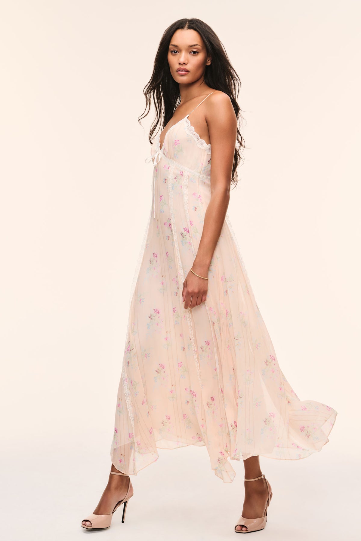 Floral print silk slip dress with lace-trim spaghetti straps and V-neck, flowing midi skirt