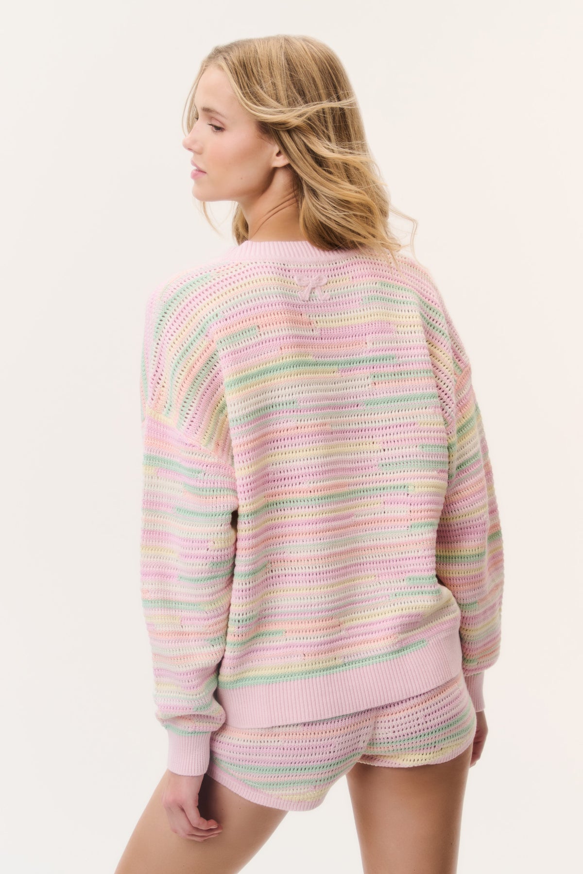Pastel striped crochet pullover back view, ribbed hem and long sleeves