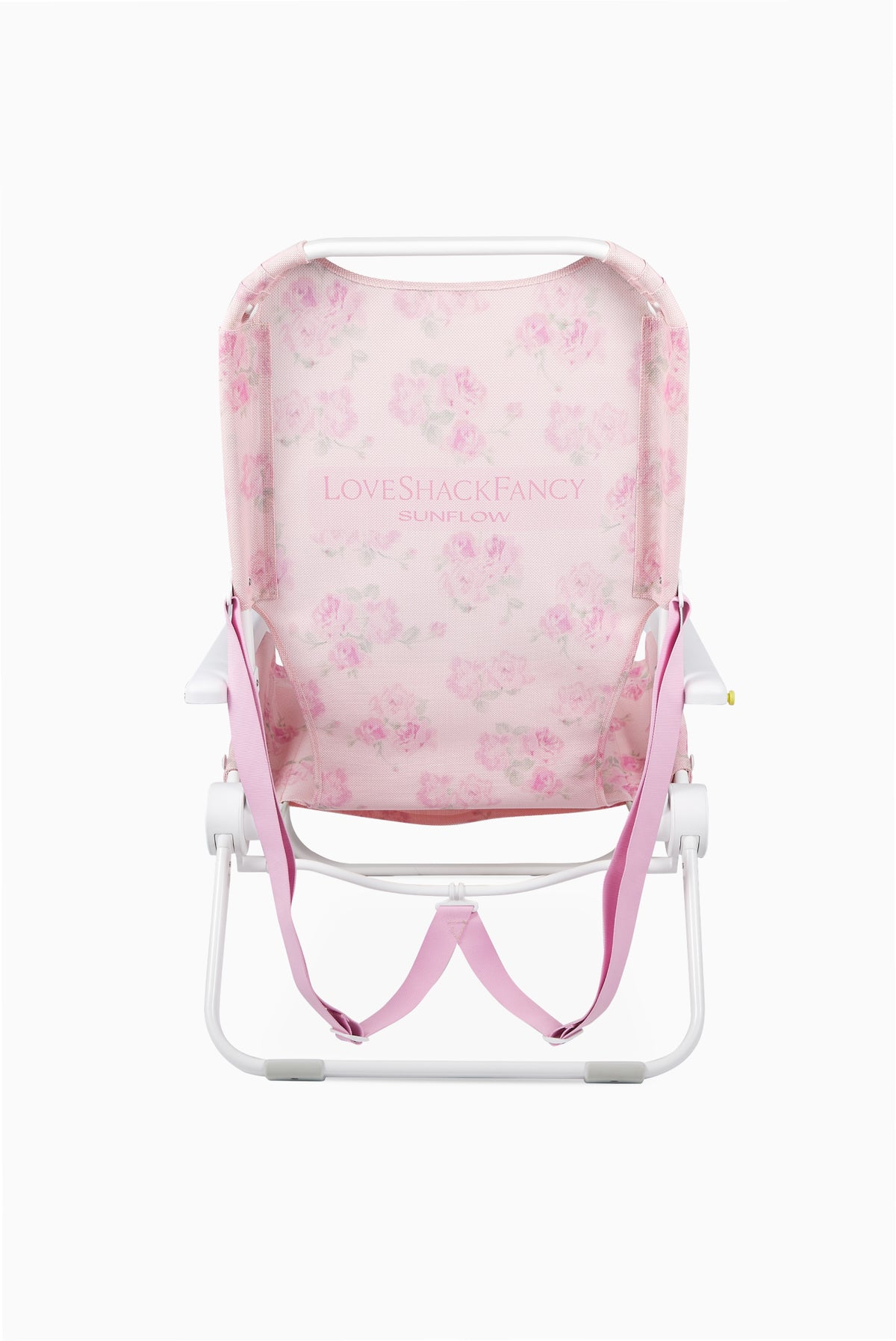 Pink floral ikat beach chair with mesh seat and adjustable straps