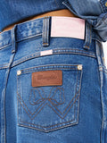 Denim mini skirt back pocket with Wrangler logo patch and signature stitching