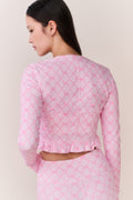 Pink printed zip-up active top, long sleeves, V-neck back view, ruffled hem