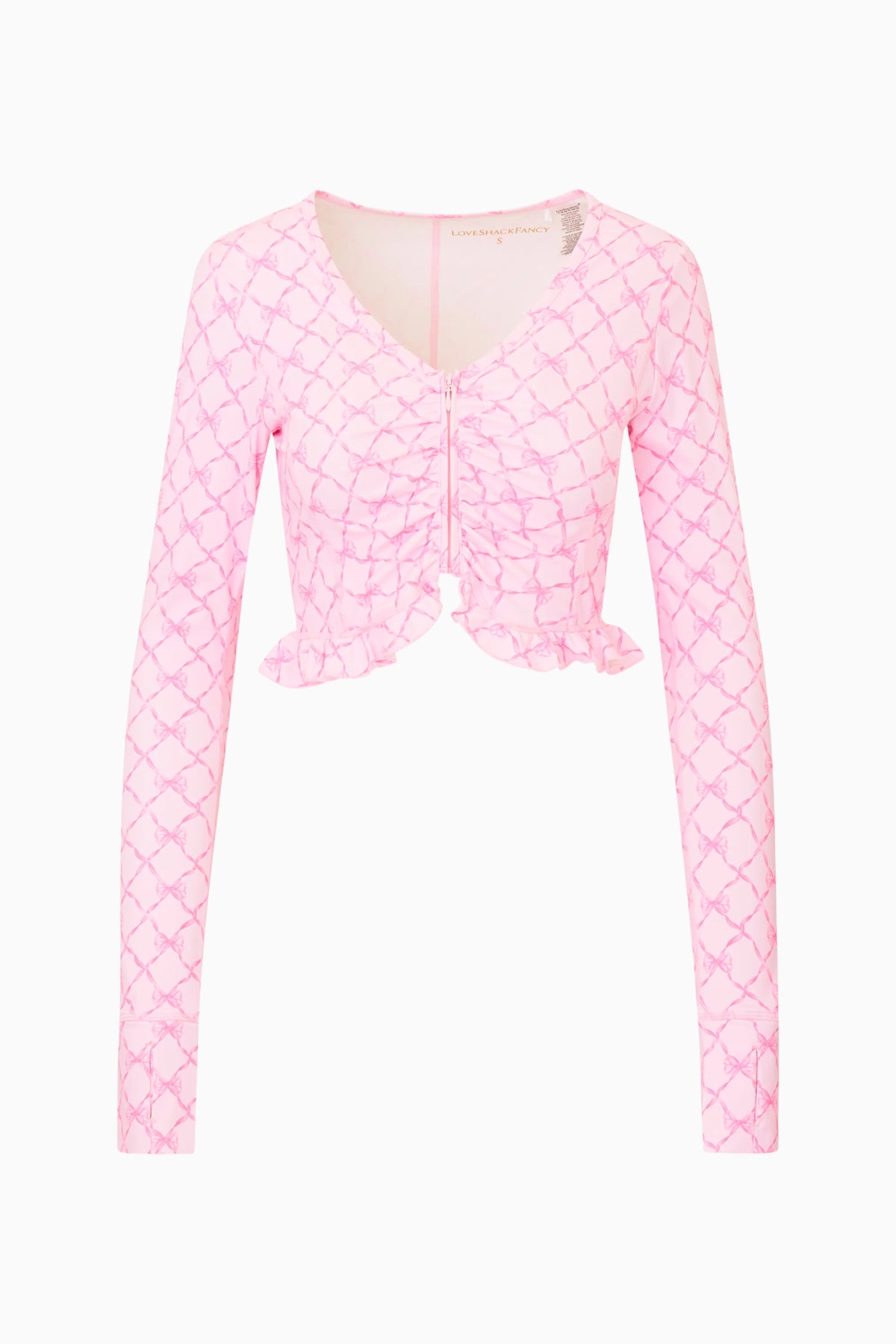 Pink printed zip-up active top with V-neck, long sleeves, and ruffled hem