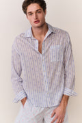 Light blue patterned cotton unisex shirt, button-up collar, long sleeves, front view