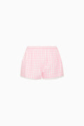 Pink gingham girls' shorts with elastic waistband and ruffled hem