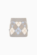 Girls argyle knit skirt with gray base, light blue diamond pattern, side pockets