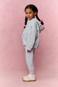 Girls floral light-blue sweatpants, side view, cuffed legs and drawstring waist