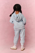 Girls floral light-blue sweatpants, back view with drawstring waist