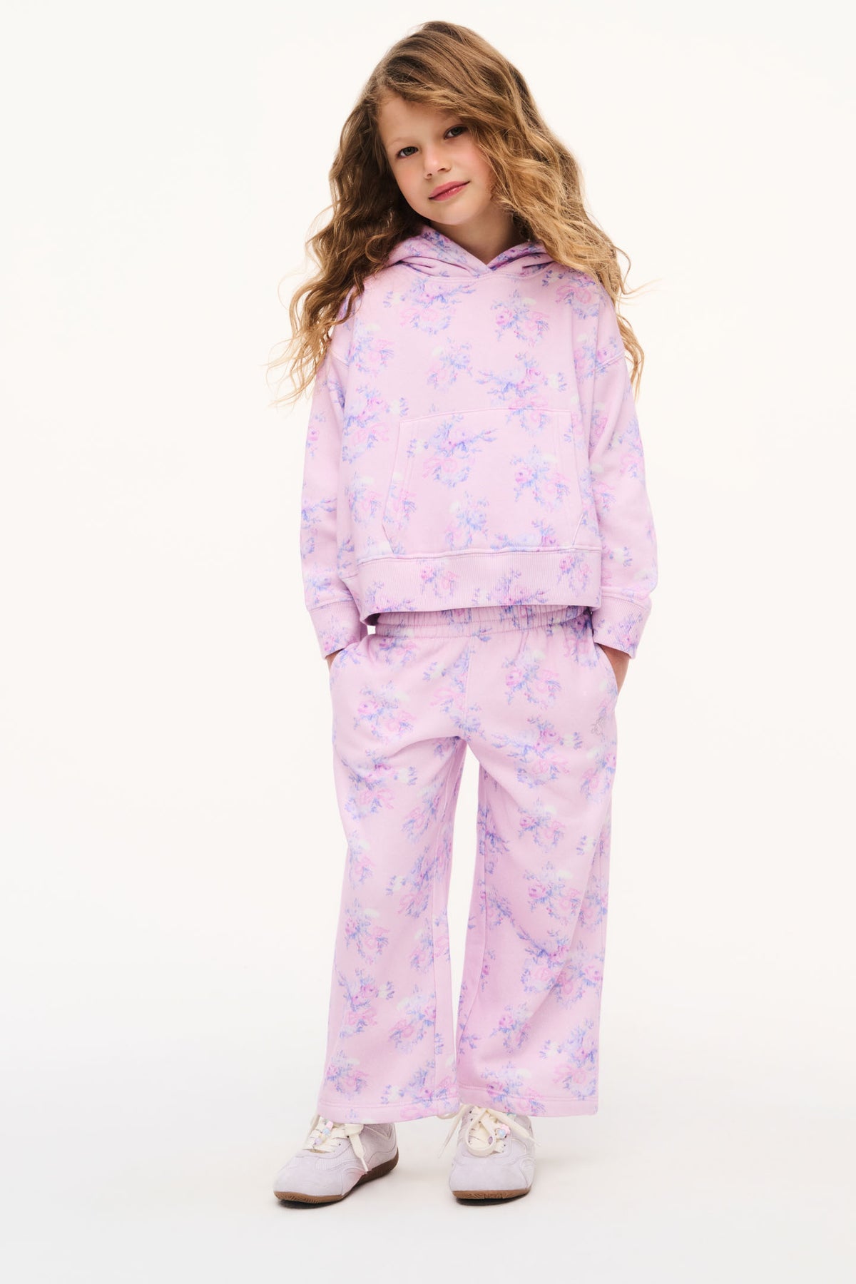 Girls' mauve floral print sweatpants with elastic waistband and wide legs