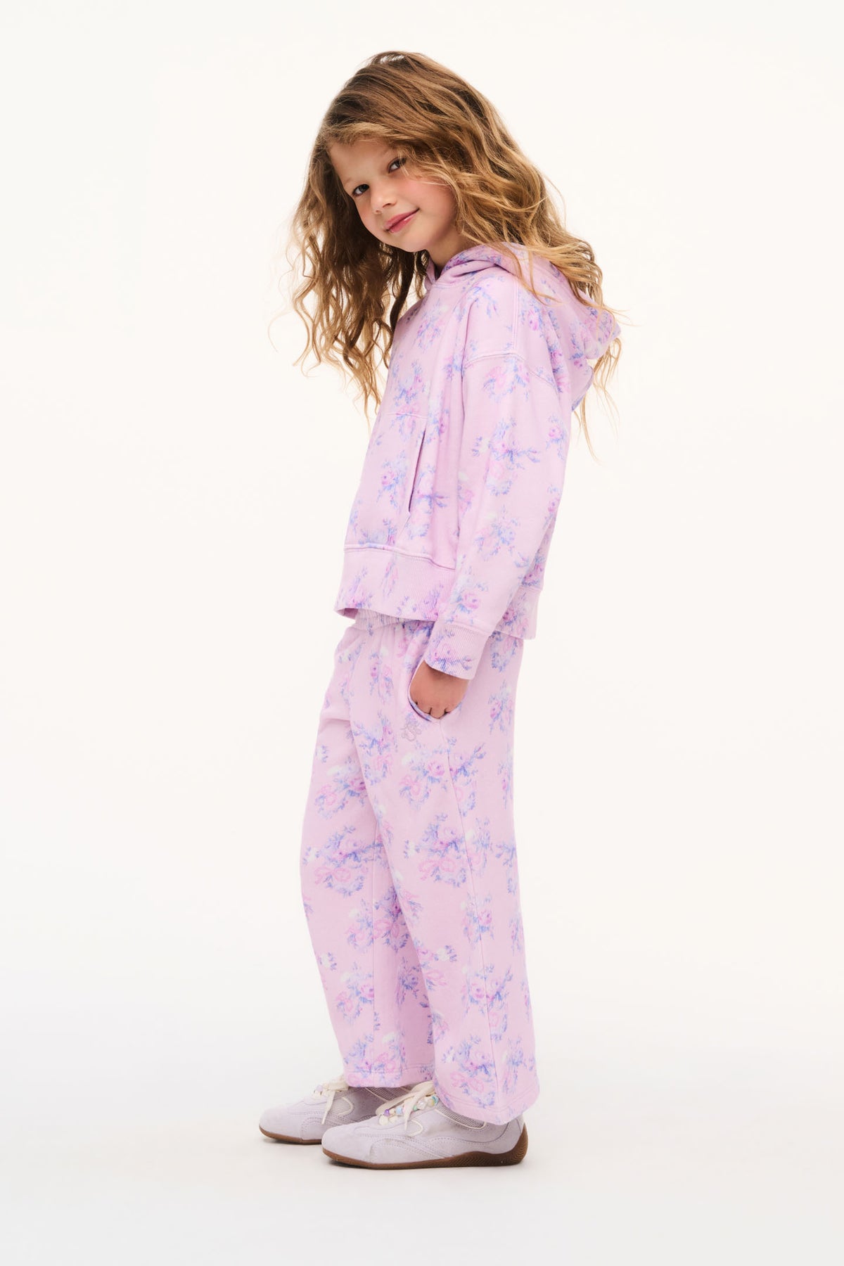 Girls' iced mauve hoodie and jogger set, side view with floral print