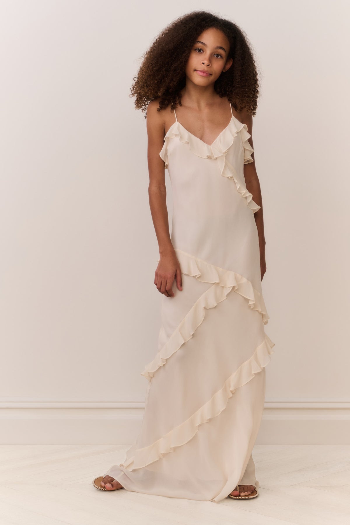 Ivory girls' maxi dress with cascading ruffles and thin shoulder straps