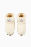 Off-white girls ankle boots with faux-fur lining and small logo label on the side