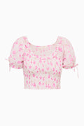 Pink floral printed peplum top with puff sleeves and smocked bodice