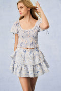 Blue floral smocked short-sleeve tiered mini dress with ruffled skirt