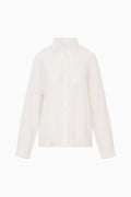 Embroidered cotton button-up shirt, long sleeves, collared neckline in white