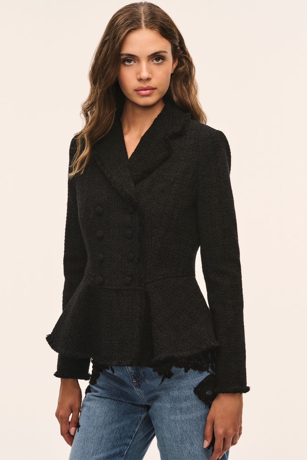Black tweed peplum jacket with V-neck, peplum waist detail and long sleeves
