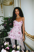 Sommaire appliqué dress in pink floral lace with strapless corset bodice.