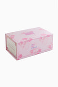 Pastel pink mahjong tile box with OH MY MAHJONG and floral graphics