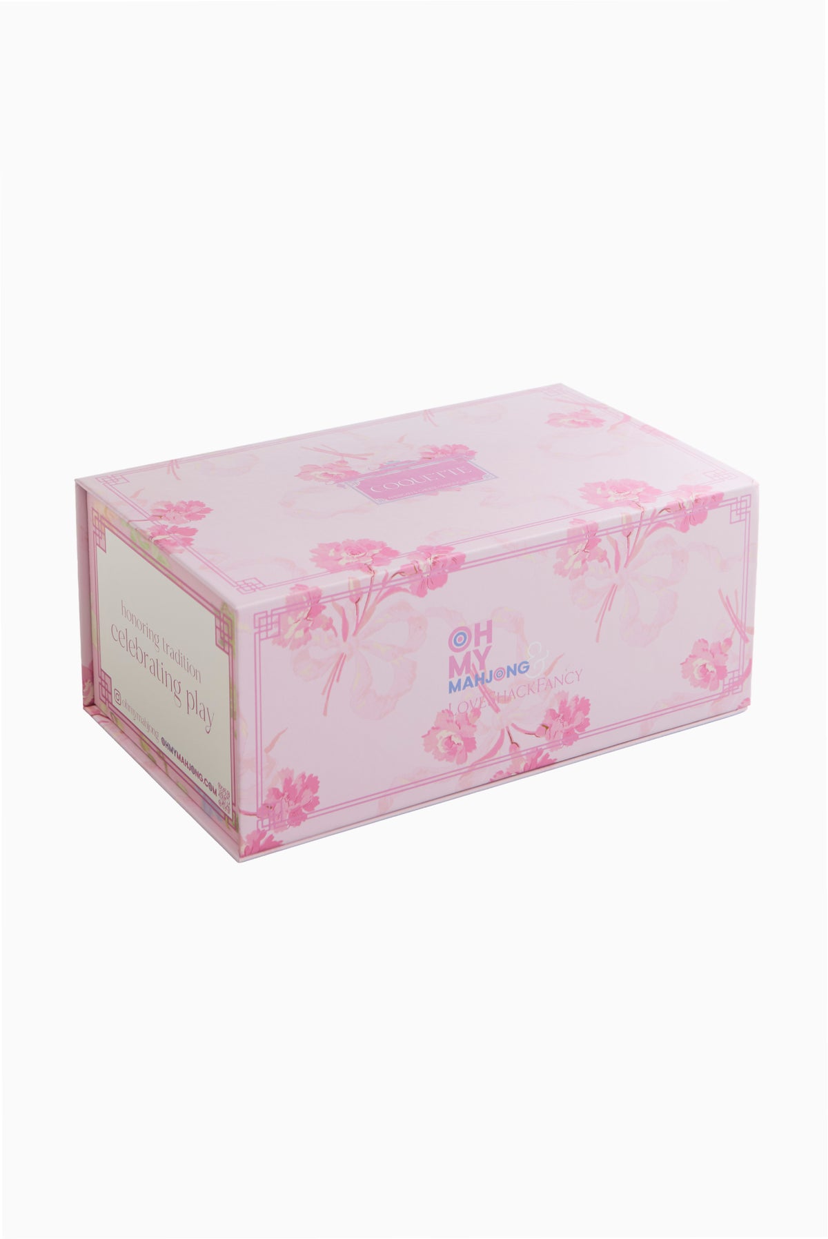 Pastel pink mahjong tile box with OH MY MAHJONG and floral graphics