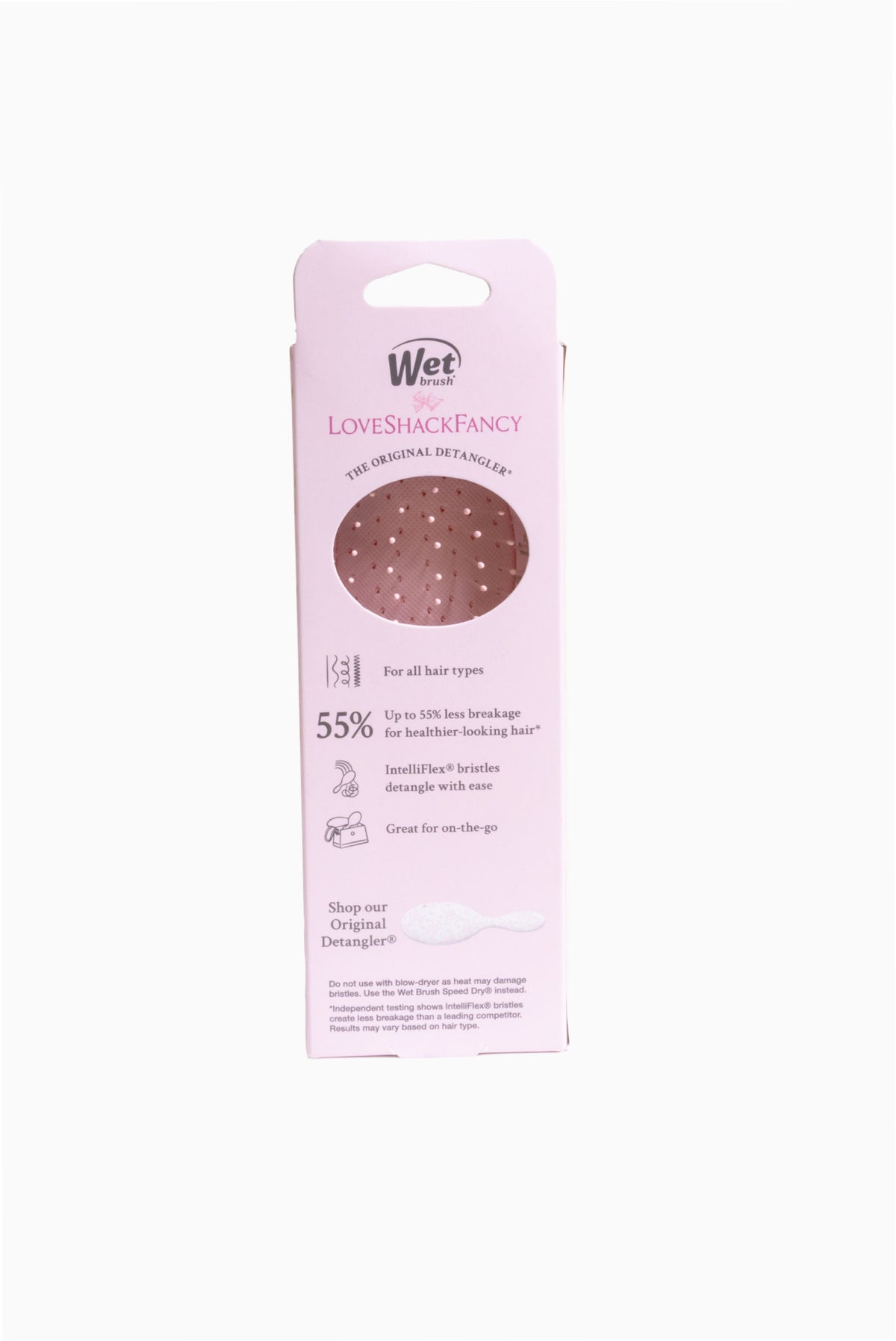 Pink packaging for Wet mini detangler brush, floral pattern and product details