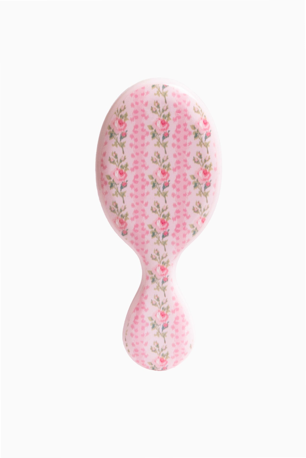 Pink floral mini detangling hair brush, oval shape with short handle