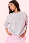 Light lavender pullover sweatshirt with NASHVILLE graphic and ribbed cuffs