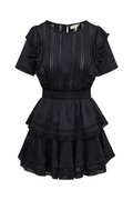 Black mini dress with ruffled sleeves, smocked waist, and tiered skirt with vertical stitching