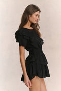 Black mini dress with layered ruffle sleeves and tiered hem