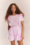Pink mini dress with ruffled puff sleeves and tiered skirt
