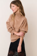 Brown cashmere turtleneck sweater with cozy knit texture