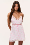Floral satin mini slip dress with lace trim, spaghetti straps, and V neckline