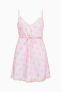 Floral satin mini slip dress with lace trim, thin straps, and gathered waist