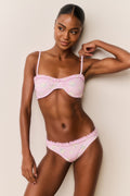 Pastel pink floral balconette bikini with ruffle trim and matching high-rise bikini bottoms