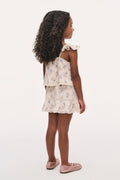 Little girls tiered ruffle floral skirt, light base with gathered hem detail.
