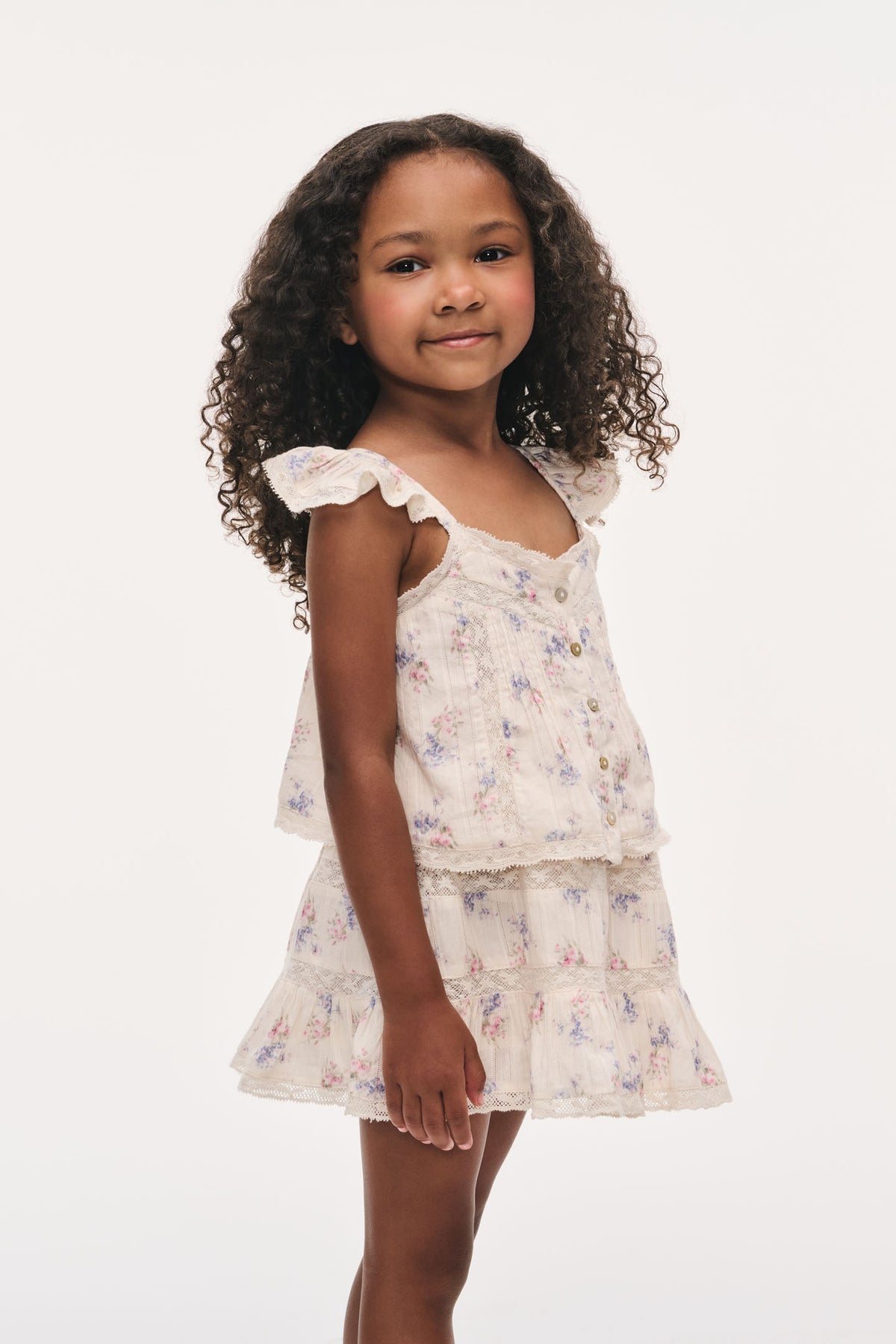 Little girls Norina top with ruffled straps, button front, pastel floral print