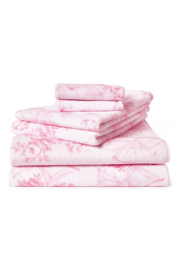 Pink patterned cotton wash cloth stack, neatly folded