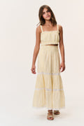 Pale yellow tiered tween skirt with lace-trim ruffles and layered hem