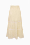 Light yellow tiered tween skirt with elastic waist and lace trim