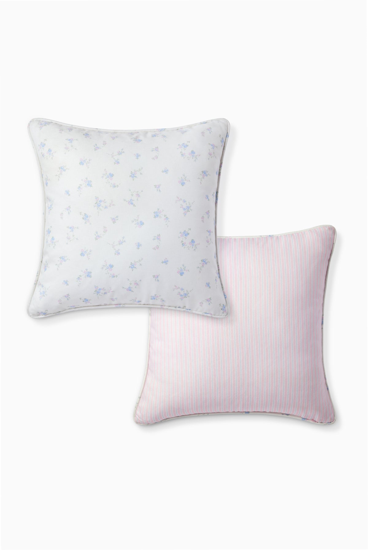 Double-sided outdoor pillow with blue mini motifs on one side and pink stripe on the other