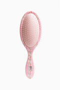 Pink floral hair detangling brush with wide oval bristle head