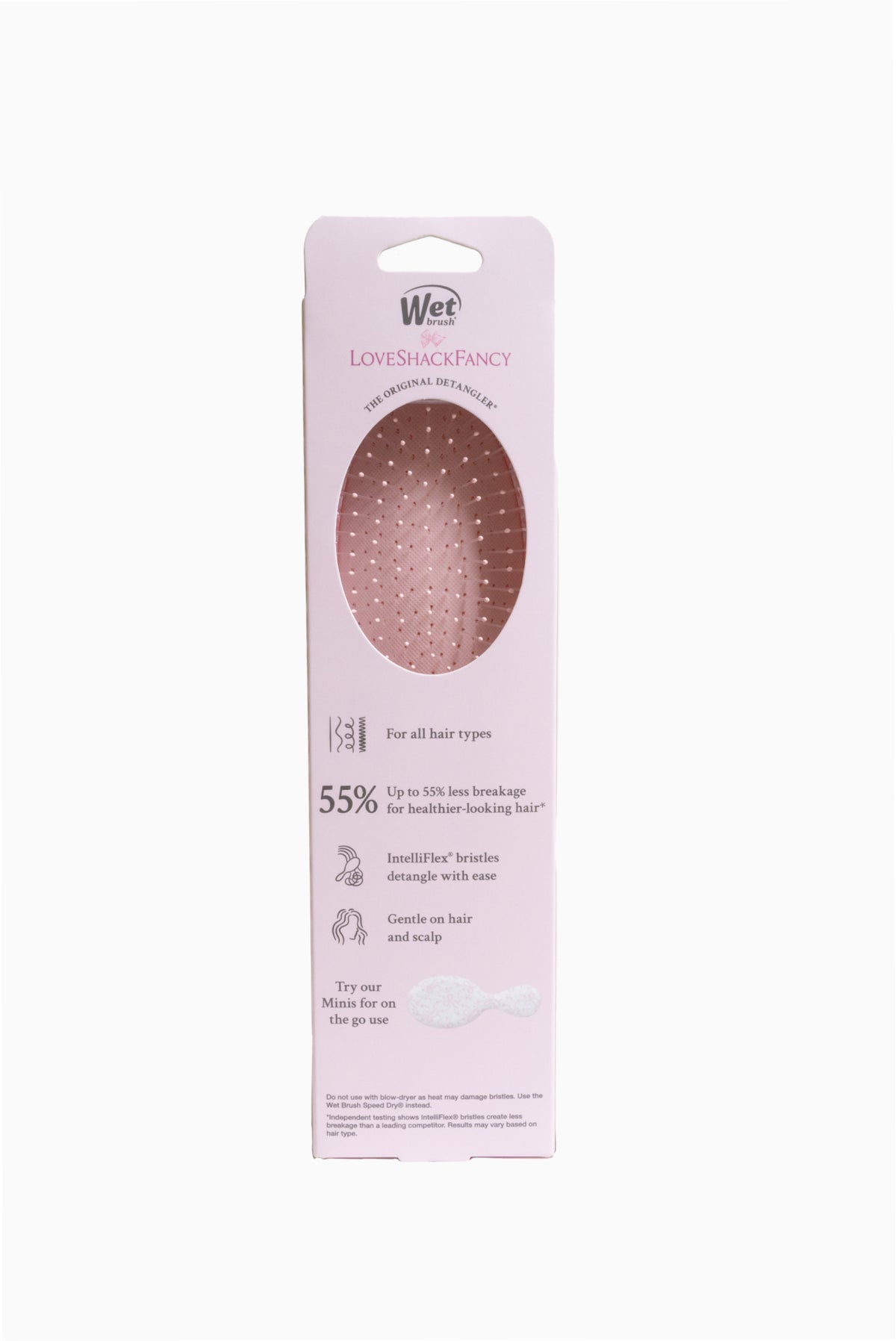 Back of Wet LoveShackFancy detangler brush packaging with 55% claim