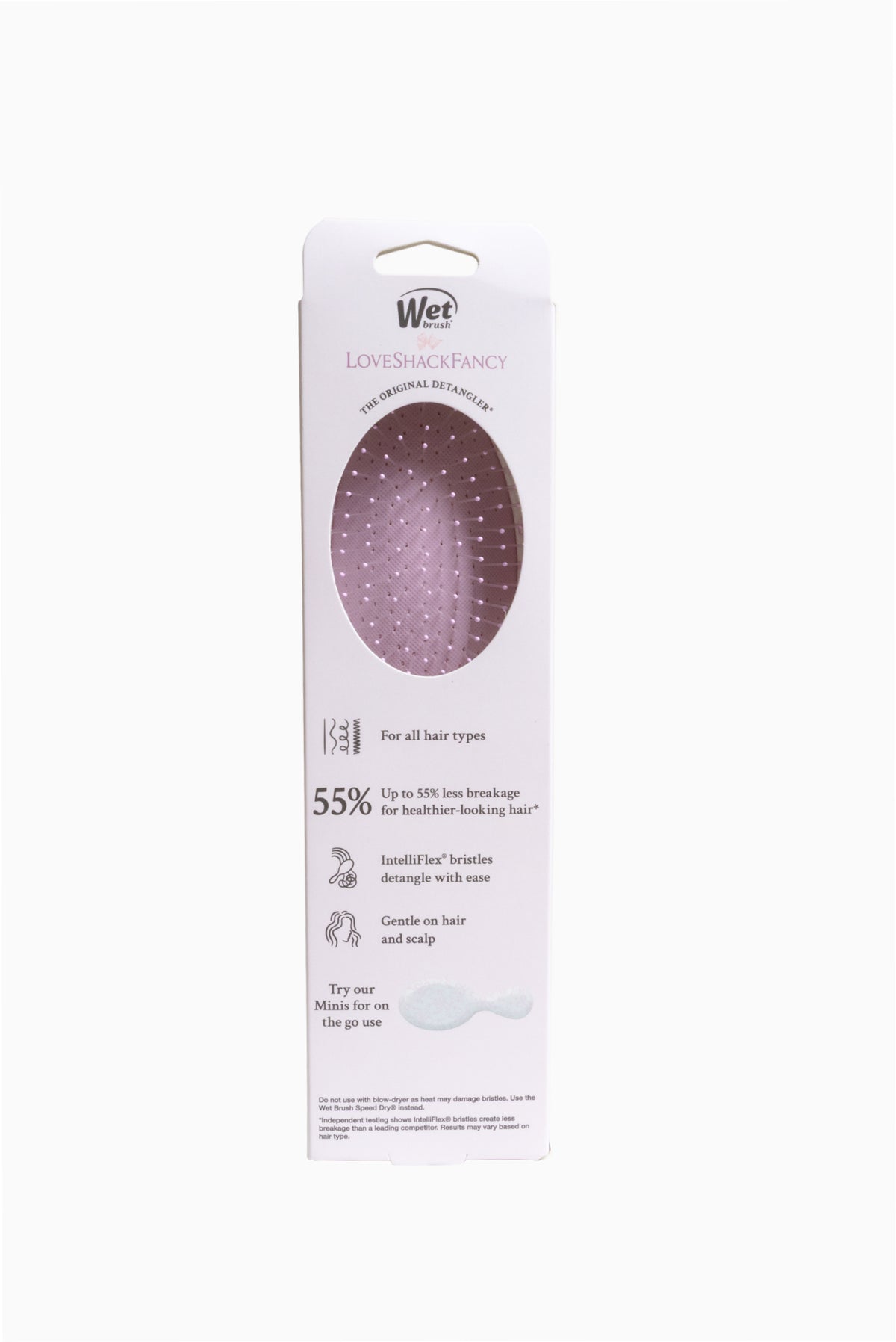 Wet x LoveShackFancy detangler box back with product details and 55% claim